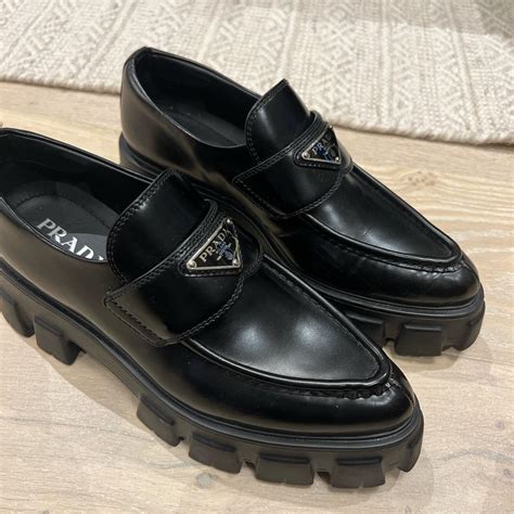 prada monolith loafers value.